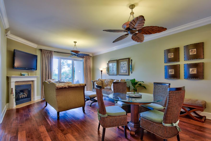 Sanctuary at Redfish is a premier, luxury gated community south of Highway 30-A consisting of 64 units and located on 14 beautiful acres surrounding Big Redfish Lake that spills into the Gulf of Mexico. UPGRADES GALORE, backsplash, lighting, and electrical. Features include travertine and hardwood floors, 10 foot ceilings, granite countertops, crown molding, a gas fireplace, expansive covered balcony. This unit is highly desirable because of it's first floor location towards the far end of the complex offering total privacy and easy access.