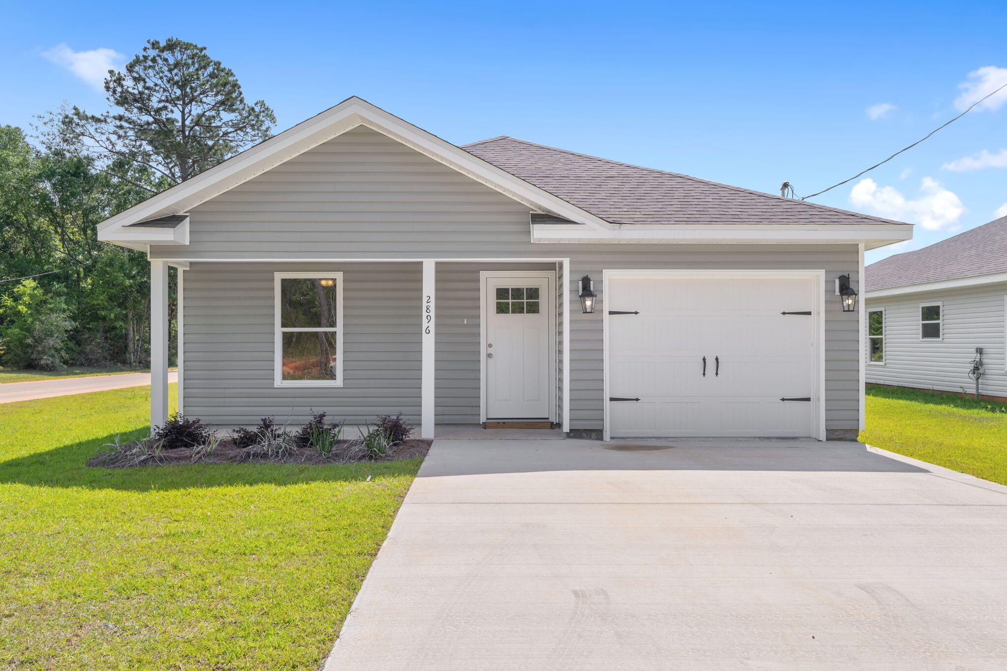 'Welcome to this new construction home, awaiting its first owner!' This 3 bed 2 bath home comes with LVP floors throughout the whole home, granite countertops and white shaker soft close cabinets. This well thought out plan features over 1373 square feet and a 1 car garage. The large covered porch welcomes you home. Upon entering the home from the spacious foyer, the two guest bedrooms are conveniently located at the front of the house along with laundry room and full bath. Just beyond the foyer is the open kitchen which overlooks the dining area and spacious family room. The kitchen features granite countertops and makes the perfect space for family gatherings.