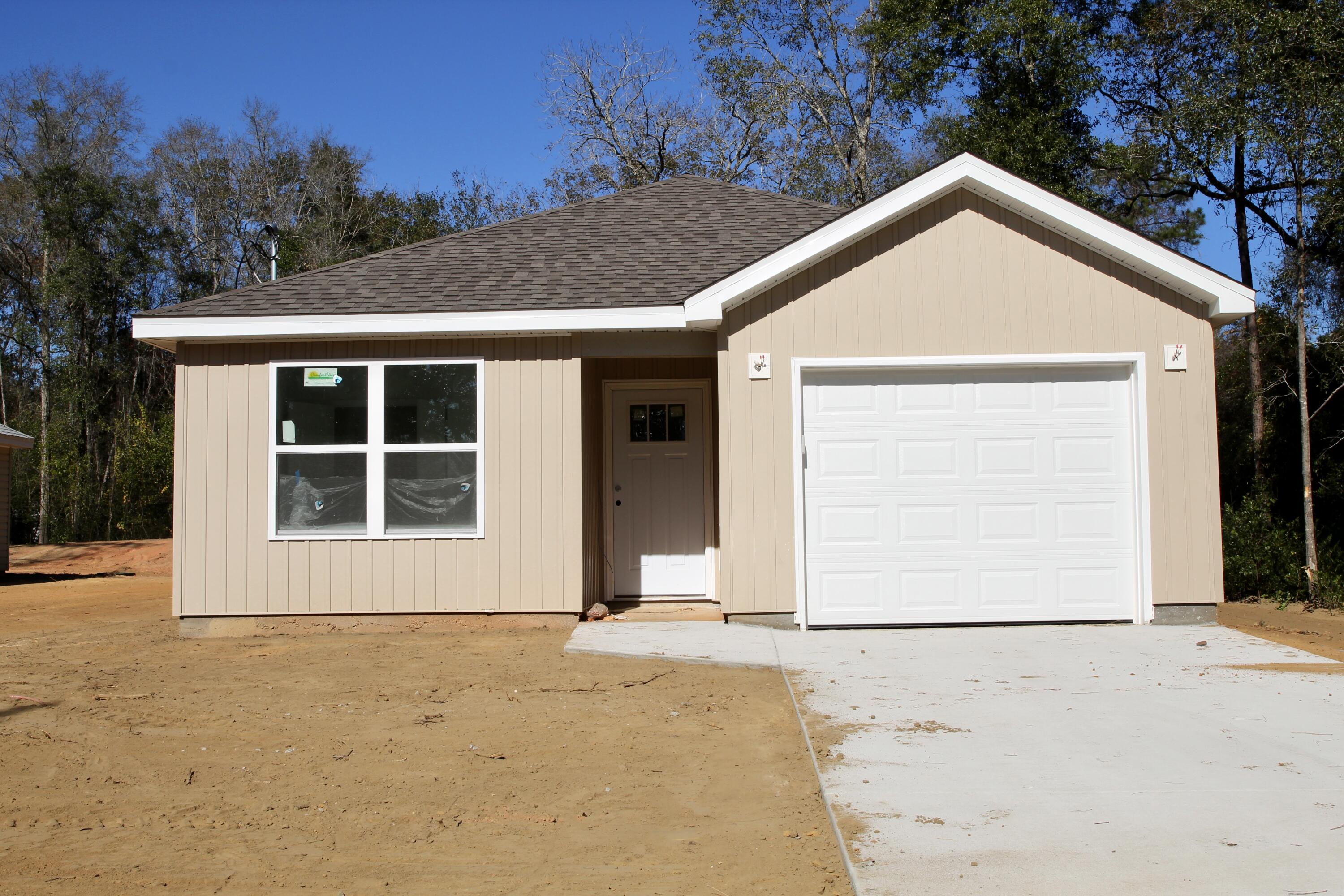 Up to $7,500 in closing cost assistance (restrictions apply). Nearly completed and can close in 30 days or less! This gem offers 2 bedrooms, 2 bathrooms, and a host of luxurious features. This home promises to be a haven of relaxation and style. From the moment you step inside, you'll be greeted by the sleek elegance of luxury vinyl plank (LVP) flooring throughout the entire home. The heart of the home is the stunning kitchen, adorned with quartz countertops and complemented by a beautiful tile backsplash. Picture yourself preparing meals with ease on the spacious island, with the added convenience of an under-mount sink and stainless steel appliances. The open floor plan creates a welcoming atmosphere, perfect for entertaining guests or simply enjoying day-to-day living. Natural light floods the space, highlighting every detail of this thoughtfully designed home. Don't miss your chance to make this stunning home yours and experience the best of modern living! Lender credit of $1,500 and Homes for Heroes credit (Qualifying Heroes are Military, Law Enforcement, Medical Professionals, Fire Fighters and Teachers) $1,00.00. Pictures are from a previously built home. Updated pictures to follow soon.