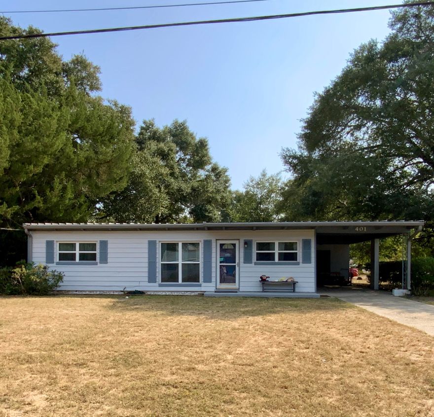 If you are looking for a turnkey home, this adorable house is just for you!  There have been lots of renovations and updates throughout the years.  Some of the recent improvements are a new gas range and microwave.  The living area, dining room, and kitchen flow seamlessly into each other, making this open floor plan perfect for gatherings and entertaining.  There are wood-beamed, vaulted ceilings, updated lighting, a renovated bathroom, and LVP flooring, which are only some of the improvements that await the new owners.  Plenty of closet space, an indoor laundry, fenced backyard, carport, just so many great features.  Corner lot with convenience to shopping, medical, beaches, and Air Force bases. Would also make a fantastic Airbnb!
