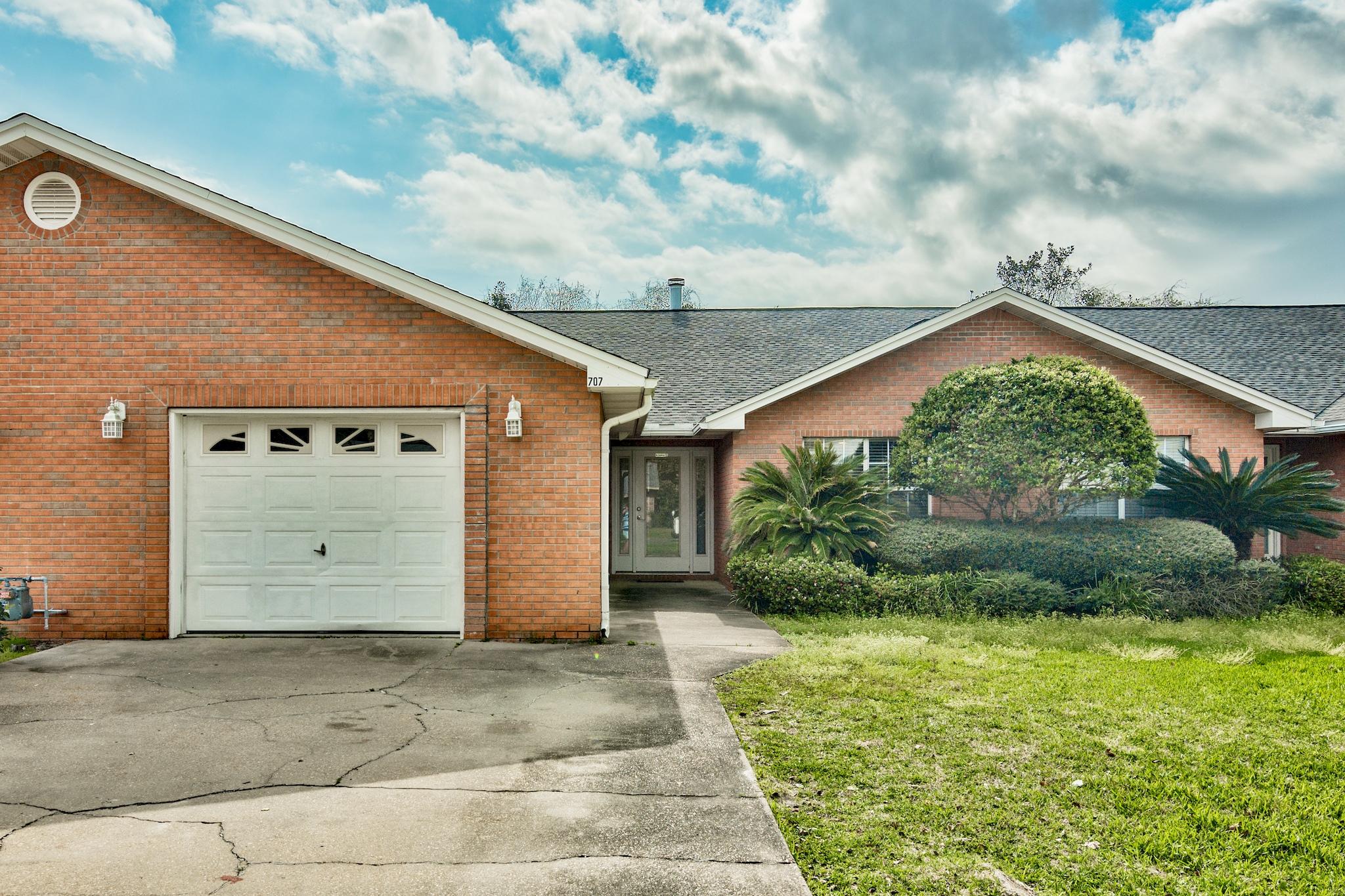 Single story town home located on a huge lot in the heart of Destin just minutes to the harbor! This 3 bedroom/2 bath unit features a fireplace, large open living room and kitchen with lots of counter space and cabinetry, granite counters throughout, all new paint throughout, new Moen faucets and Baldwin locks, new Pergo laminate floors in the bedrooms, tile throughout the living room, dining area, and kitchen, and a covered porch. The whole complex had a NEW ROOF installed in 2016. The Clement Taylor Park is walking distance away and features a beach area, dock, gazebo, playground, grills, and sand volley ball court. This unit will not last long so come take a look! Seller will purchase a one year home warranty at closing up to $450. Buyer to please verify all information all information