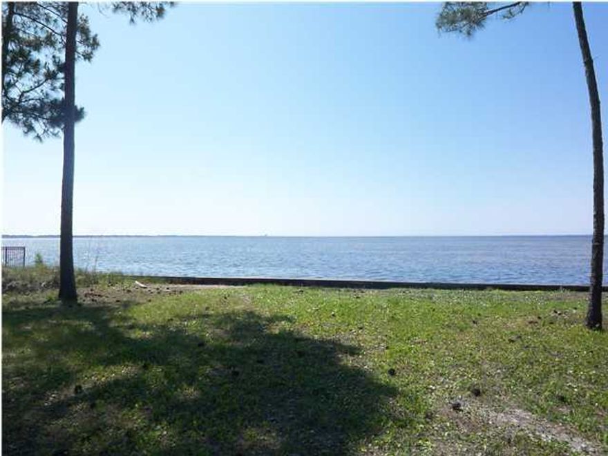 Estate sized bay front homesite. Located in the double gated community of Burnt Pine at Sandestin. One of the few bay front homesites remaining in the resort. Don't miss out on your opportunity to own a piece of the dream. Watch sunsets from your private dock, take the golf cart to the beach, enjoy a round of tennis, golf on any one of the 4 golf courses on property, shop, dine and dance in the Village of Baytowne Wharf or at the Grand Boulevard at Sandestin. Or if relaxing is more your speed, spend the day at either of two full service spas located on the resort or just sit back and enjoy the white sand beach. It's all right in your neighborhood. Sandestin also offers a private owner's Beach Club and Burnt Pine golf memberships that are available. Amenities, privacy and