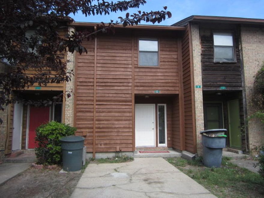 VERY NICE TOWNHOME IN GREAT LOCATION OFF OF HOLLYWOOD BLVD. SO CONVENIENT TO AREA SHOPPING, RESTAURANTS,SCHOOLS AND BOTH BASES. THE UPSTAIRS BATH HAS BEEN REMODELED AND THE TUB RESURFACED. CERAMIC TILE DOWNSSTAIRS AND CARPET UPSTAIRS. WASHER AND DRYER HOOK UPS ARE INSIDE. THERE IS A SMALL STORAGE ROOM OUTSIDE IN THE REAR AND A A SMALL STORAGE CLOSET ON THE FRONT. THE REAR YARD IS SMALL AND PARTIALLY FENCED.