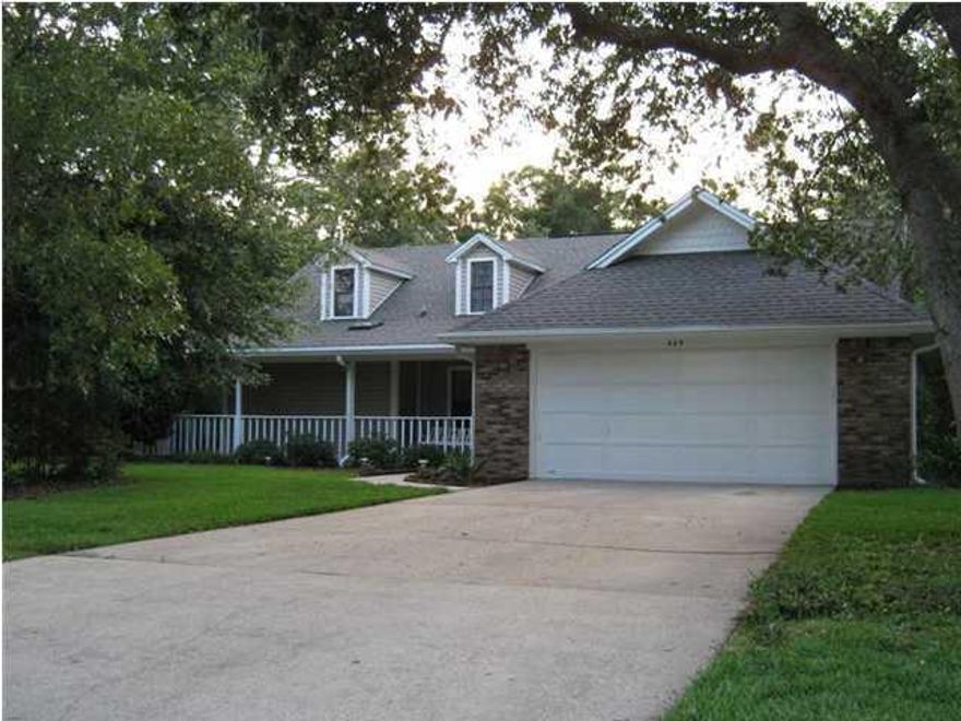 **AVAILABLE SEPTEMBER 20th**
A MUST SEE lovely home on nearly a half acre lot, with a Wrap-Around Porch! Conveniently located in Bluewater Bay - AND in the Bluewater Elementary school zone! It has 4 Bedrooms, 3 Full Baths! Tile is in the kitchen and baths. New stainless steel appliances in kitchen. The Master Bedroom and two additional bedrooms are located on the FIRST floor. There is an additional (HUGE!) 21x17 Bedroom upstairs - with its own bath! It can be used as a second Master, Mother-in-Law Suite, Guest Quarters or a Recreational Room! Gorgeous hardwood flooring is throughout the entry, living room and hall area. The Living Room has a vaulted ceiling and beautiful brick fireplace! Pictures are representative of the home, but not current.