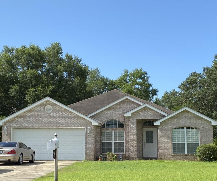 Beautiful All Brick Home on a Nice Large Lot Centrally Located in Shalimar! Convenient to Eglin AFB and Hurlburt Field. This is a Tracy Acree Construction Home with Great Curb Appeal. Enter into the Foyer with Dining Room on Your Left. Dining Leads to Massive Kitchen with Center Island. This Opens to the Living Room with a Corner Fireplace. 10 Foot Ceilings! Spacious Owner's Suite with Jetted Soaker Tub and Separate Walk-In Shower. 3 Additional Bedrooms and Bath on Right Side of Home. Screened Porch spans almost the Length of the Back of the House. Would be a Perfect Place to Watch the Swimmers Should the Buyer install a Pool! Fenced Yard. Irrigation. Opportunity awaits! Professional Photos Coming Soon. Photos of vacant home.Buyer to verify measurements and pertinent info.