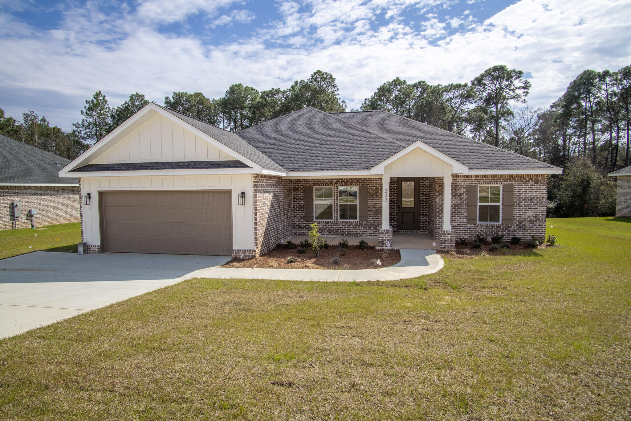 This 4-bedroom, 2-bath home in South Crestview offers an open layout with a combination of brick and fiber cement siding on the exterior. The main living areas flow seamlessly, providing an ideal space for everyday living.The breakfast area features a picture window, offering natural light and a view of the surrounding area.The property is conveniently located with access to grocery stores, medical services, shopping, dining, and major roadways including Hwy 85 and I-10, as well as other regional destinations.Some of the photos shown are examples from the builder's previous projects and may not reflect the exact features of this home.