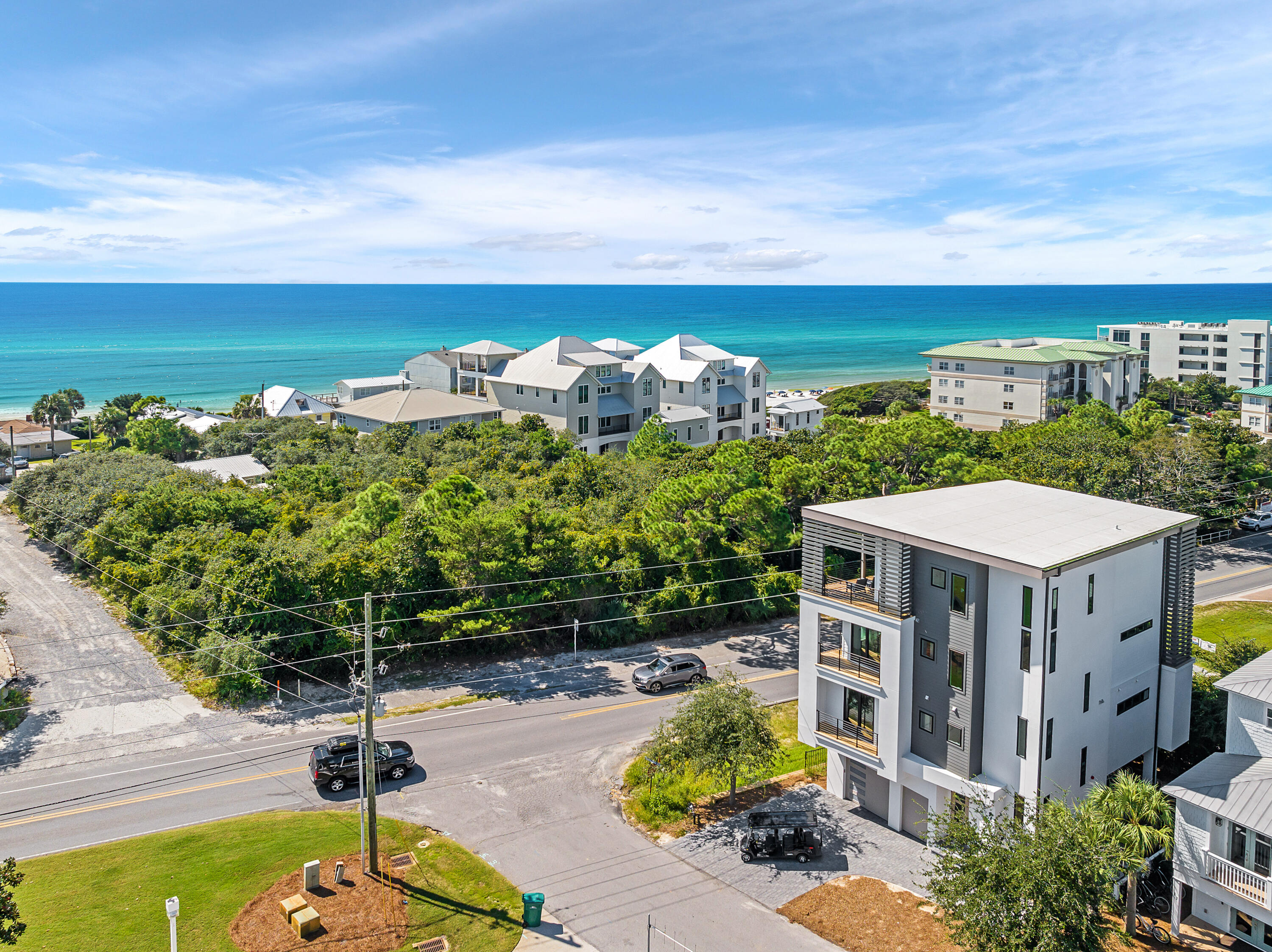 Introducing a stunning new construction home embodying modern beach flair in Seagrove, nestled between Seaside, Greenway Station & The Hub on 30A, all within a short bike ride. Enjoy panoramic Gulf views & being steps to the newest Regional Beach access. With rental projections of $250k(+), this coastal retreat boasts 5 ensuite bedrooms plus a bunk room, 6.5 bathrooms total & an elevator for convenience. With a private pool, 3,785 sqft of conditioned space plus 1,024 sqft of balcony space, this home invites you to savor outdoor living while soaking in the breathtaking views. A double garage, large owner's closets on each level & multiple laundry rooms ensure every practical need is met, allowing you to focus on embracing the idyllic beach lifestyle. Whether you're seeking a serene retreat or an entertainer's paradise, this home offers the perfect blend of luxury, comfort & convenience. Welcome home to seaside bliss, where coastal dreams become reality. 