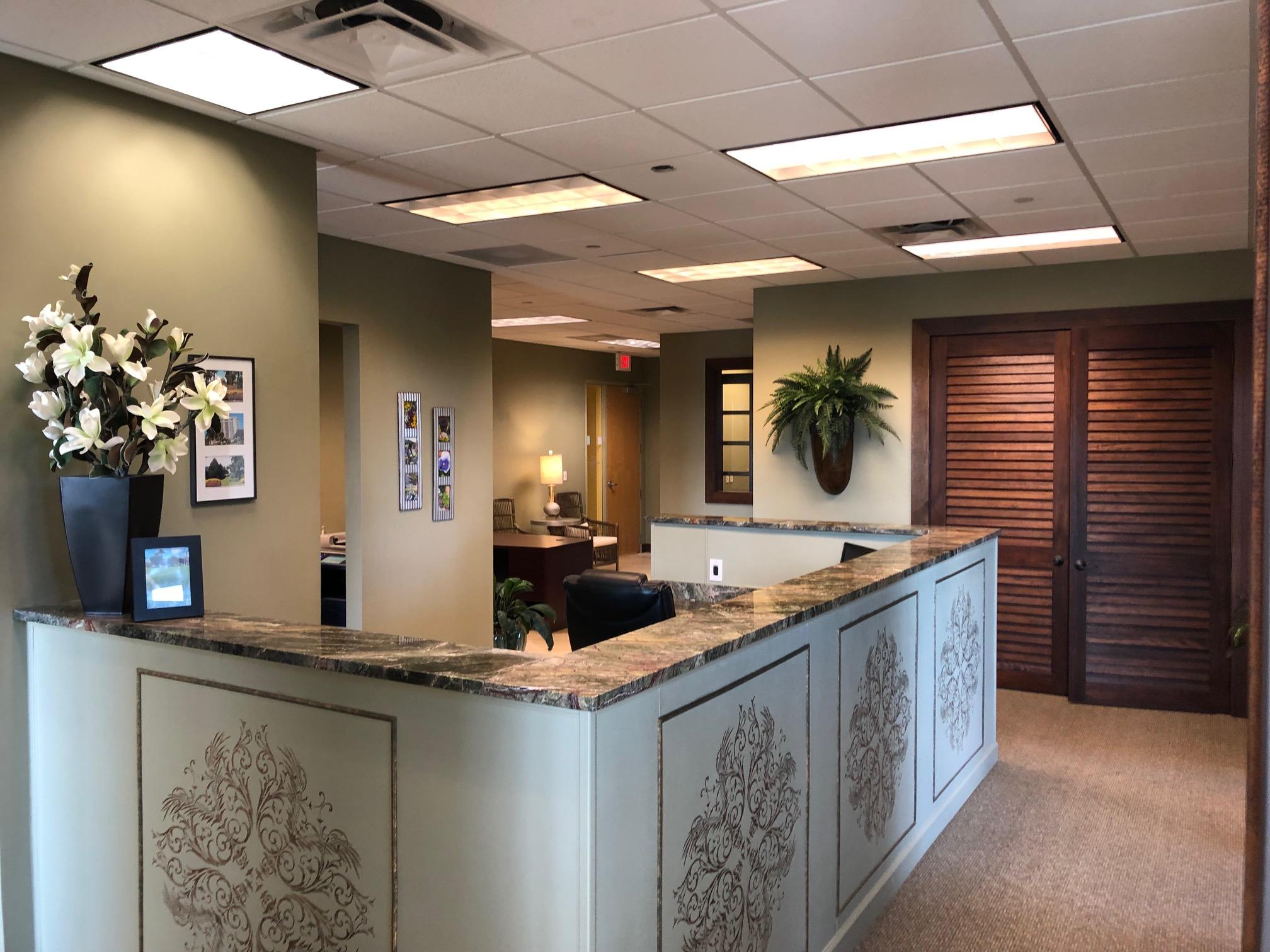 Fine office space available for ''sublease'' in Grand Blvd. This 2500 SF office unit is fully furnished. It is located above Fleming's Steak House and has great views of the main street scene at Grand Blvd. The office consists of a warm reception area, small conference room, 4 executive offices, large conference room, breakroom with fridge. Additional built-in work space is in place. This sublease has approximately 1 year remaining on the term. The actual lease expires 3.31.21. The sublease rent has been reduced from $5,016.63 per month to $4,000 per month. This includes use of the furniture, base rent, triple net fees and sales tax. The tenant will need to pay for its electricity use which on average is $266 per month. Please call me for additional details.