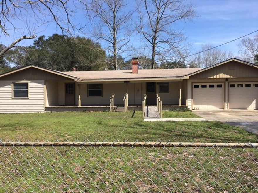 Motivated sellers! Bring ALL offers! With a little TLC, this 3/2 on huge lot can be an adorable starter home or great rental property. An attached 2 car garage and large great room add to the extra living and storage space. Come check it out!