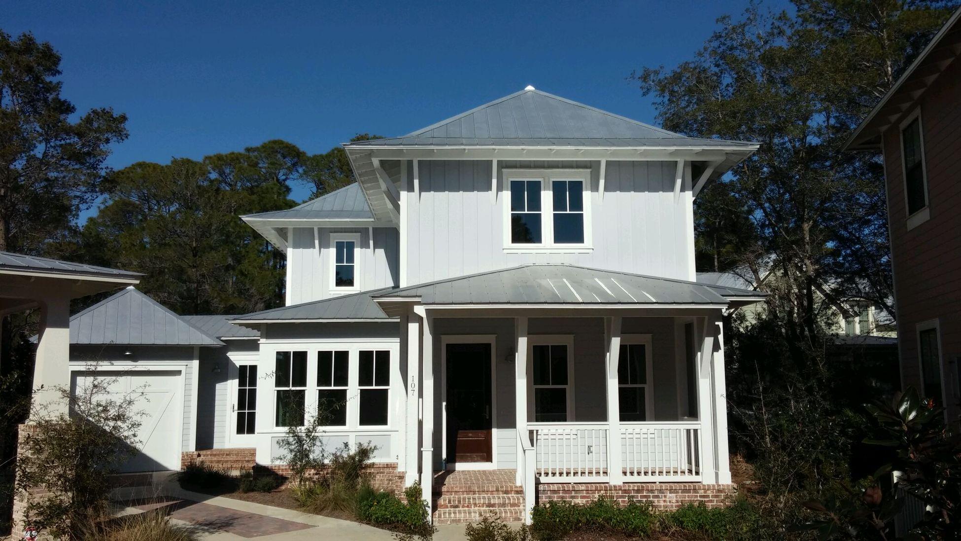 This house is a must see located in Forest Lakes, 30A's best kept secret and only minutes to the beach. The Seanest is a spacious 4 bedroom and four and half baths with formal dining room. This homes consists of endless upgrades. Fenced in back yard with paved pod off back porch hosting a beautiful trellis with a fire pit A spacious back yard for your pets, outside shower, summer kitchen, plus two parking spaces besides the garage. Gas lanterns, and both back porches will be screened in. The interior will have shiplap walls, upgraded appliances, farm sink, pot filler, custom back splash,farm doors and beautiful exposed beams. The master bath will have a large walk in shower with tub.