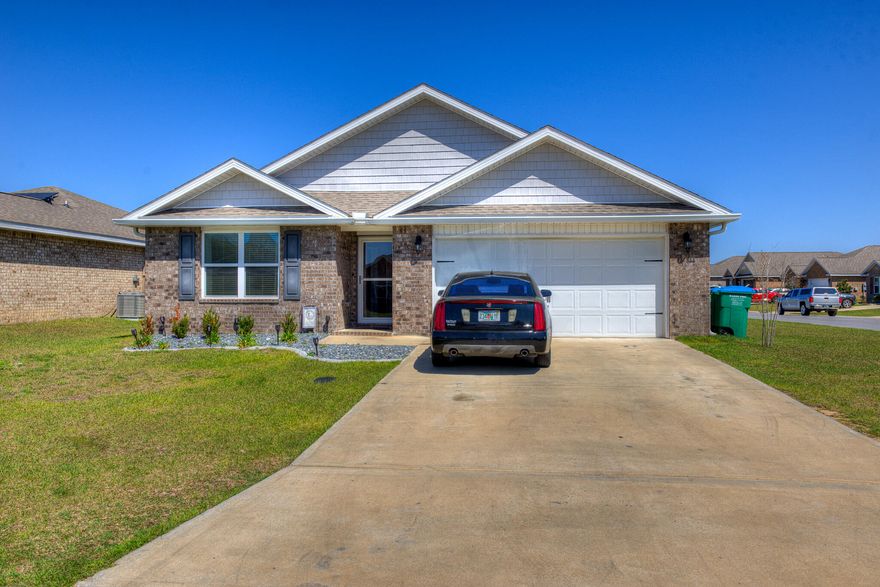 Beautiful home in the newly-developed Red Stone Commons neighborhood. This corner-lot family home has many bonus features like a SkyBell security system,  ceiling fans throughout, over-sized refrigerator and back splash in the kitchen, gutters all around,  privacy fence, storm door, window blinds, extended stone patio with beautiful landscaping. The Red Stone Commons community has a sparkling pool and summer kitchen area for its residents to take advantage of for BBQ's and parties all year round.