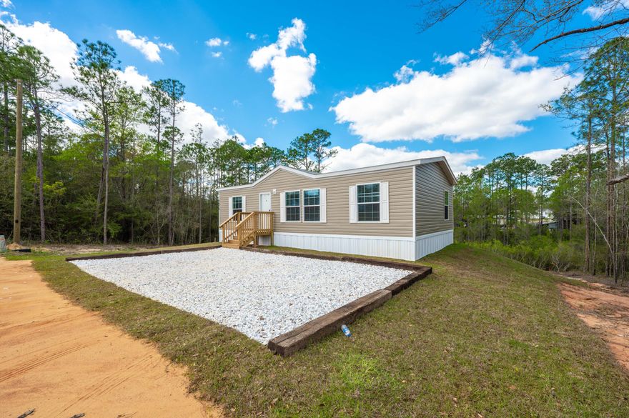 Available Now!! Brand new home in the country. No HOA restrictions. 3/2 home with fantastic finishes. Country cute, this great new home boasts vinyl plank barnwood flooring, farm sink with white cabinetry, cool vent hood and open floor plan. Large rooms and bathrooms.