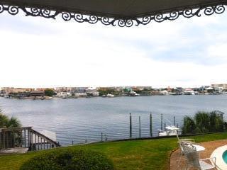 One of the prettiest views on the Destin Harbor. The property is owned by the children of some of the early settlers of Destin. The existing house was built in 1981. Master on the first floor. New kitchen in the last 3 years. New Master Bath installed approximately 2007. Beautiful well-maintained pool over-looking the harbor. Dock with covered slip and plenty of room for expansion.Listing Broker and Co-List Agent are also the owners of this property.