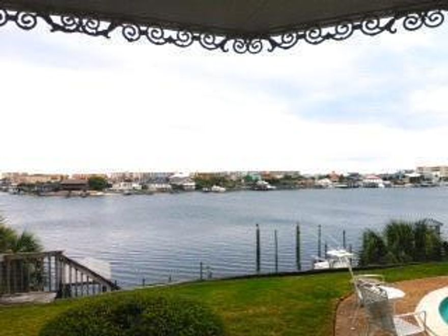 One of the prettiest views on the Destin Harbor. The property is owned by the children of some of the early settlers of Destin. The existing house was built in 1981. Master on the first floor. New kitchen in the last 3 years. New Master Bath installed approximately 2007. Beautiful well-maintained pool over-looking the harbor. Dock with covered slip and plenty of room for expansion.Listing Broker and Co-List Agent are also the owners of this property.