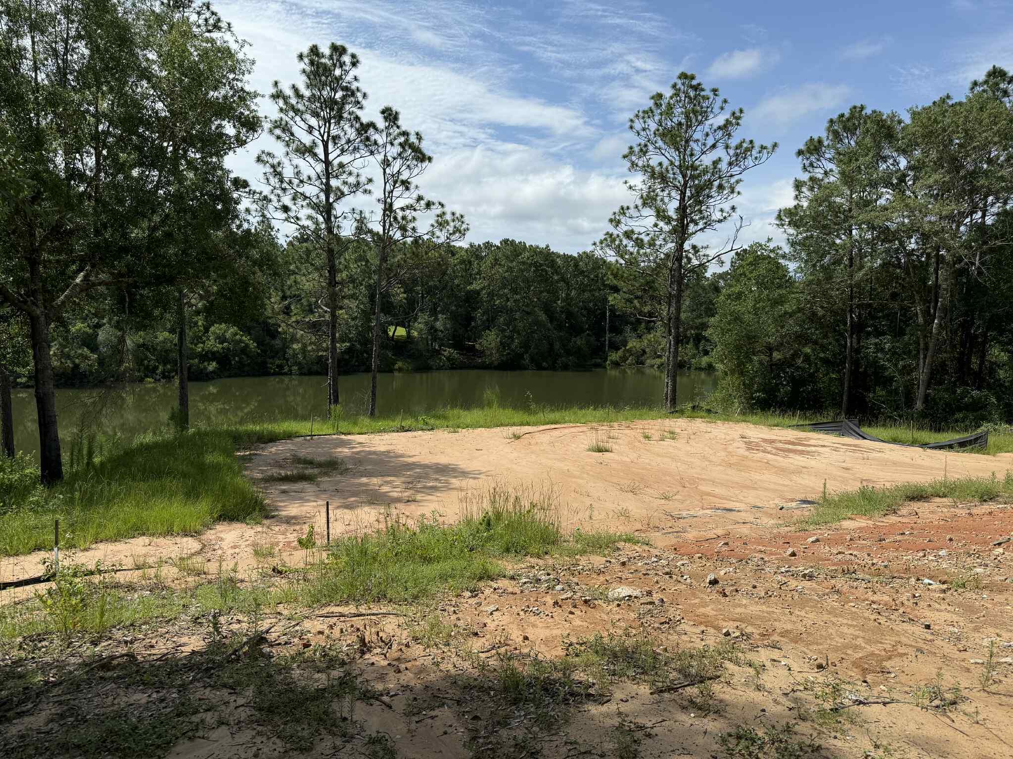 This prime waterfront parcel offers an extraordinary opportunity to design and build the home you've always dreamed of, right on the water. Perfectly situated to capture breathtaking views and serene sunsets, this lot has already been cleared, filled, and professionally prepped to save you time and money in the building process.
