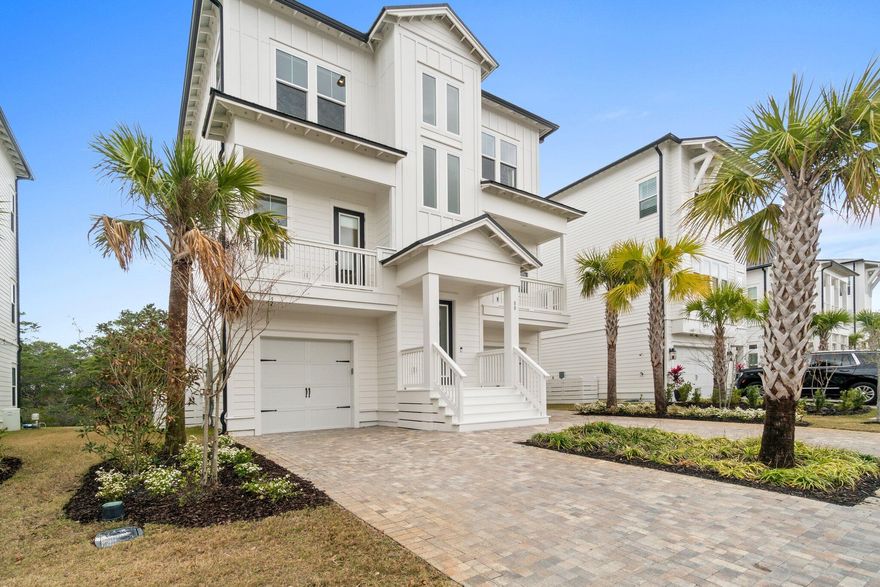 Rare opportunity on the beach side of 30A in Blue Mountain Beach: a recently built, three-story home in a private gated community, designed for comfortable year-round living or high-demand vacation rental income. The property backs to a peaceful nature preserve and is only minutes by golf cart to multiple beach accesses, restaurants, shops, and the 18-mile Timpoochee Trail -- an ideal mix of lifestyle convenience and strong market appeal. Why this works for an investor or a full-time resident:
- Six ensuite bedrooms (including a primary suite with private balcony, spa-style bath, and large walk-in shower) plus a built-in bunk room that sleeps eight -- excellent for flexible rental configurations or multigenerational living.
- Three finished levels served by an elevator, four balconies and a screened porch that extend living space outdoors year-round.
- Turnkey, high-end finishes: designer kitchen with gas range, oversized island, stainless appliances, built-in grilling area with granite counters, and upscale lighting and fixtures throughout.
- Built for rental demand: two finished garages, ample community parking, and on-site entertainment features (foosball, arcade, PlayStation, cornhole, ping pong) that drive bookings and repeat guests.
- Strong location advantages: short golf cart ride to beaches, within walking distance of local dining and coffee, direct access to the Timpoochee Trail, and proximity to multiple public beach entries.

Practical notes:
- Six full bathrooms, flexible bedroom mix (4 king suites + primary + bunk room), generous open-concept living areas with abundant natural light, and multiple outdoor entertaining spaces including a ground-level patio with built-in grill.
- Quiet, private setting with preserve views -- attractive for year-round residents who want coastal lifestyle without sacrificing privacy.

This property is positioned for solid rental performance and long-term appreciation given its 30A location!