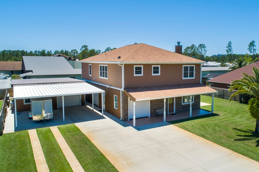 UNDER CONTRACT WITH CONTINGENICES, SELLER ACCEPTING BACK UP OFFERS.Custom-built 3 bedroom and 3.5 bathroom masterpiece located in the heart of Panama City Beach. This executive home is impeccably maintained with custom finishes only found in the most exquisite residences in the nicest neighborhoods in Panama City Beach. Custom features of this home include a trey ceiling in the living room, premium crown molding, custom 18-inch tile in the kitchen and bathrooms, custom kitchen cabinets, tiled bathroom showers, and hardwood floors in main living areas. The first level of this home contains a room that could serve as a living room or entertainment room. This room has a massive ''movie-style'' projector screen that comes down discretely from the ceiling for the ultimate in entertaining.