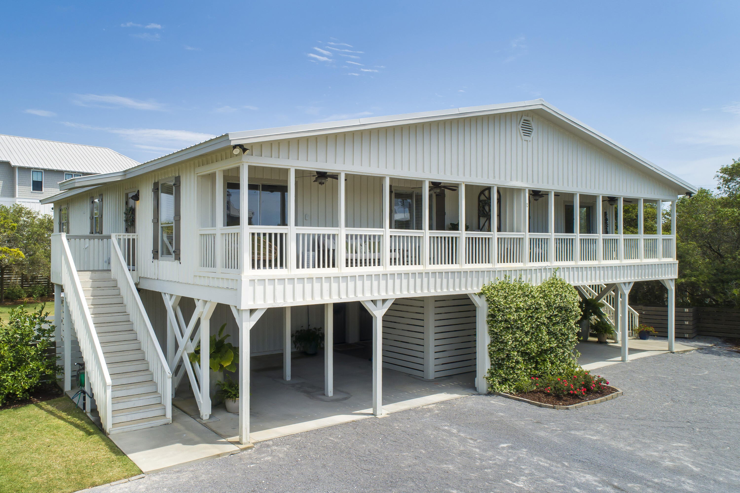 Extremely rare opportunity to own a duplex located along Scenic Highway 30A with DEEDED beach access just a short walk away. This home sits on an almost 1/2 acre lot. Plenty of room to build a pool or carriage house next to the immaculate outdoor kitchen that was recently completed. Each side has 3 bedrooms and 2 full bathrooms. Living/Kitchen/Dining and 2 bedrooms/1 bath are on the second floor. Master & master bath on 1st floor. TONS of parking with 4 spots covered and a huge driveway to accommodate other cars. Strong rental potential with the ability to rent out each side separately or together.