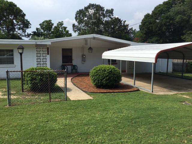 MOVE IN READY!!! This 2 bedroom 2 bath home has been well maintained and loved for many years. You will fall in love with its gorgeous yard that has an abundance of room for kids, pets, and entertaining guests. There is a huge yard building that has a washroom, workshop, and extra storage room! Inside you will find 2 living areas, kitchen, dining room, 2 BIG bedrooms plus an extra room that can be used as an office, nursery, or sitting room for one of the other bedrooms. There are 2 full baths that are in excellent condition. This is a lot of home for the money! A MUST see to appreciate.