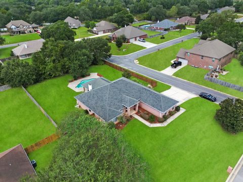 Photo of 6057 Paige Point Drive, Milton, FL 32570 (MLS # 986655) Photo of 6057 Paige Point Drive, Milton, FL 32570 (MLS # 986655)