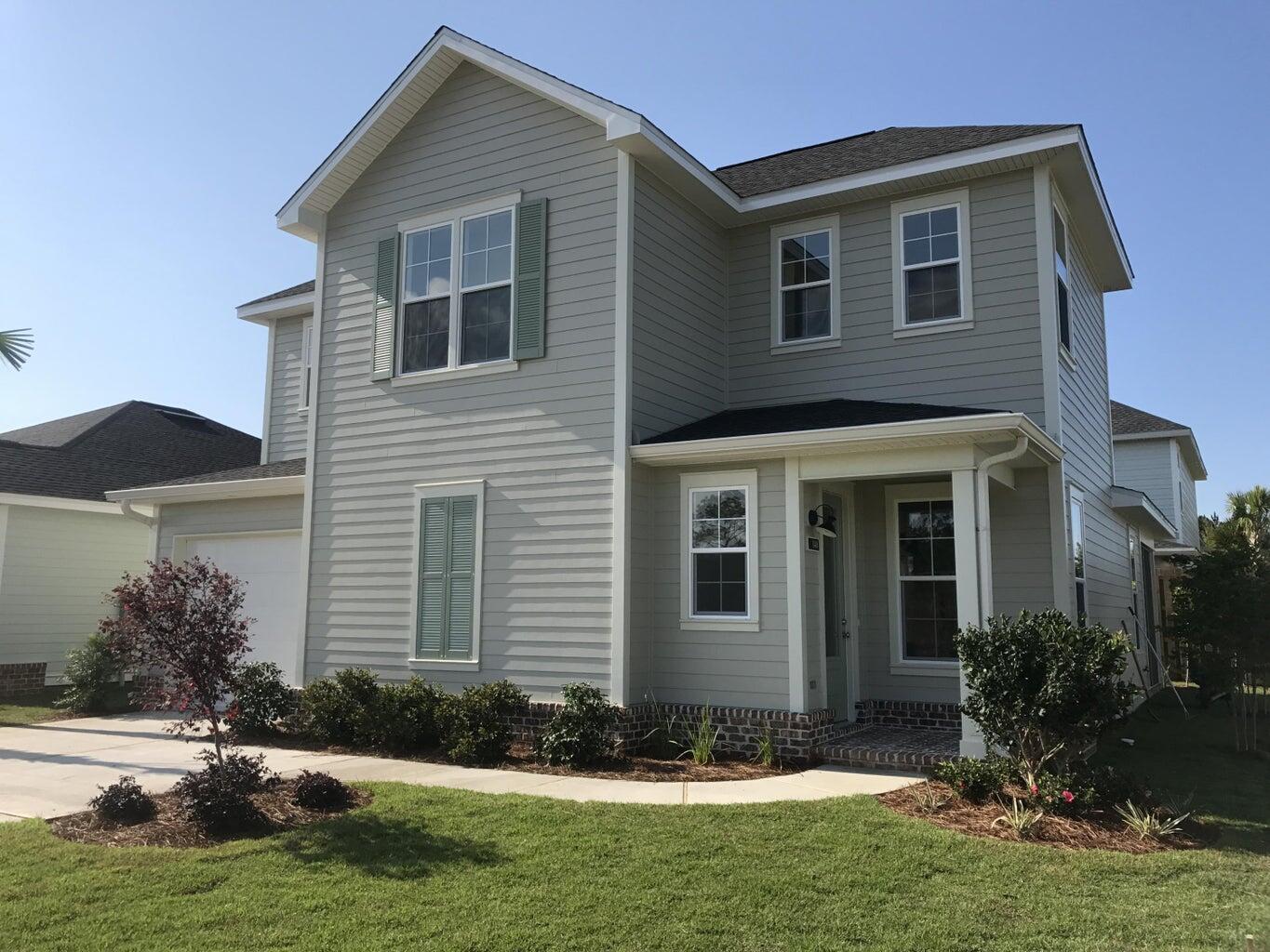 Beautifully kept home available on premium lot next to common area near community amenities! Open floor plan w/side entry foyer, 3br, 2.5bth, w/Bonus room, 1 car garage & a dual car driveway. A wonderful screened-in porch ! Fabulous Island Kitchen w/Quartz countertops, quiet close cabinetry & stainless steel appliances. 1st floor Mstr bdrm & 2nd flr holds (2) spacious bdrms, BONUS area & Jack n Jill bth. LVP wood flooring throughout 1st flr & 2nd flr bonus area w/porcelain tile in all baths. HOA community w/pool, exercise facility, clubhouse, playground & dog park. As an added bonus, ALL lawn maintenance is INCLUDED keeping entire community beautiful which is huge for overall community value. Just 5 minutes to the beach & 30A restaurants. Don't miss out on this Florida Home opportunity!