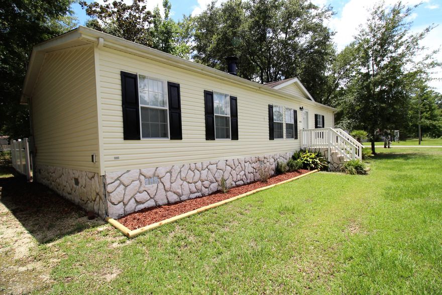 REO AS-IS. Move right in! This split floor plan has everything. Large bedrooms, great closets, garden tub, new carpet, fresh paint, fireplace, huge eat-in kitchen with an island and a brand new roof. Set on over 1/2 acre corner lot. *SELLER FINANCING POSSIBLE* *all measurements approximate*