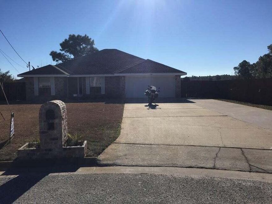 4 bedroom, 2 full bath home has tons to offer. Located on a quiet cul-de-sac, it is perfect for any size family. This home features a very open floor plan, there is a large Dining Area. The kitchen features a side-by-side refrigerator, microwave, island, and a large pop-up bar that opens up to the very large Great Room. Master suite offers a large master bathroom with double vanities, two large walk-in closets, and a whirlpool tub. For more information, contact Navarre Beach Realty property management at 850-936-0700 or come by the office at 8666 Navarre Parkway in the Winn Dixie Shopping Center. Office hours are Monday through Friday 9am-5pm.