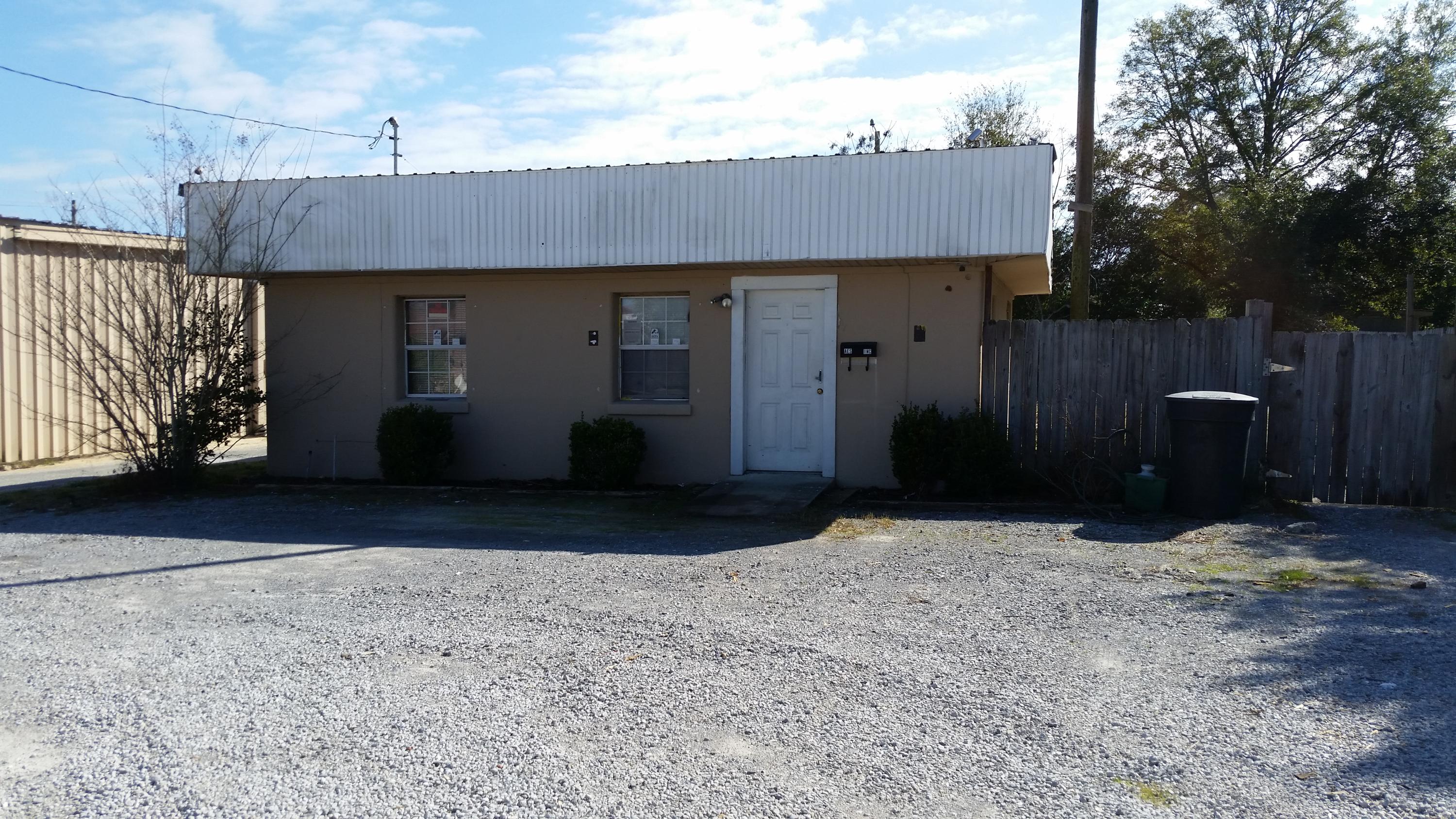 Good space with fenced lot for outdoor storage and good parking. Building has 4 separate rooms and a bathroom. Owners are licensed Realtors.