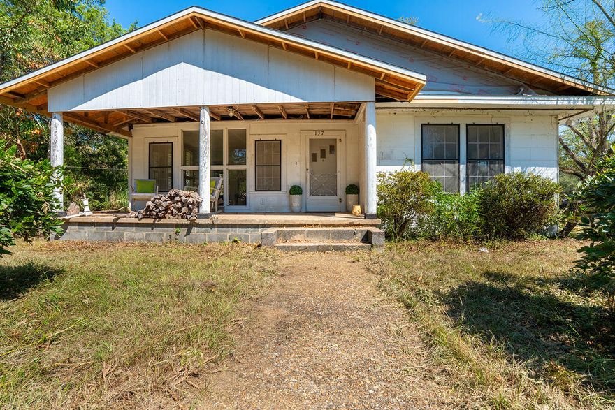 Your dream life awaits! 10.5 acres zoned agricultural with ENDLESS possibilities! A 2 BED, 1 FULL BATH, 1640 sq ft farmhouse 100+ years old with recent updates including NEW ROOF, PLUMBING, and ELECTRICAL! This property offers a separate barn great for storage, 3 car covered car port which could double as a beautiful spot for a family dinner, and a new chicken coop with chickens included. IT DOESN'T STOP THERE! A thriving pond to fish or kayak while watching the sunset is surrounded by pecan trees & fruit trees! Setting the scene for a flourishing farm, you can see the goats, cows, and horses roaming now or even a family compound! Full of rustic charm, this property is 3+ miles to Lake Jackson & 51 miles to Destin! Ask me about available loan programs.