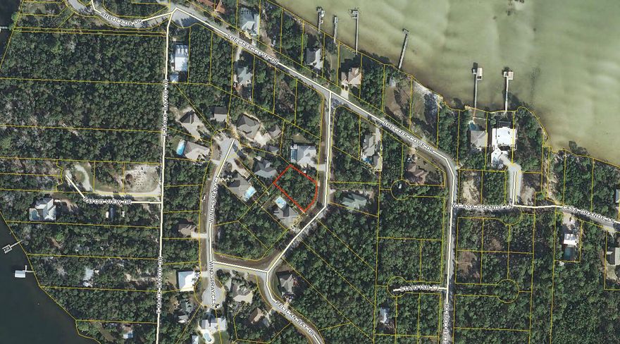 The gated community of Pelican Bay offers wonderful amenities including tennis court, private Bay Front park with picnic table, grass playground and a private dock for the home owners with deeded Bay access. This lot is already Fenced on 3 sides. Pelican Bay is close to SACRED HEART HOSPITAL, shopping,and Grand Boulevard restaurants and movie theaters.