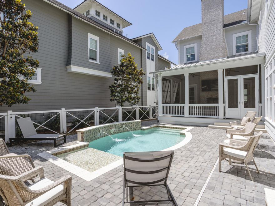 Tucked behind the hedges in WaterSound Beach, 44 Tidepool Lane sits on one of the best lots in the neighborhood--right along ''Puttering Park'' and just minutes from the sand. With a private pool, multiple porches, and four levels of updated living space, this one checks every box. The first floor features a large open living area with a tabby fireplace, exposed beams, shiplap, and whitewashed oak floors. The kitchen is fully loaded: Viking and Signature Series appliances, custom cabinetry, quartz countertops, ice maker and pot filler, everything you need to entertain or enjoy everyday life in comfort. The first-floor primary suite is quiet and private, with its own screened patio and ensuite bath.

Upstairs, you'll find a guest suite with its own morning kitchen and balcony, a large third-floor lounge, a built-in bunk room, an additional guest room with an ensuite bath and covered porch, and a second luxurious primary suite with a private covered porch overlooking the park. The fourth-floor tower offers flexible sleeping or play space, complete with twin beds.

Outside, the oversized screened porch overlooks the heated pool and swim deck, perfect for entertaining or relaxing after a day on the beach. Recent updates include a redesigned porch, repositioned windows for better views, new pool deck, fresh paint inside and out, and a custom-built bunk room.

This home delivers the best of WaterSound Beach livingand then some.

