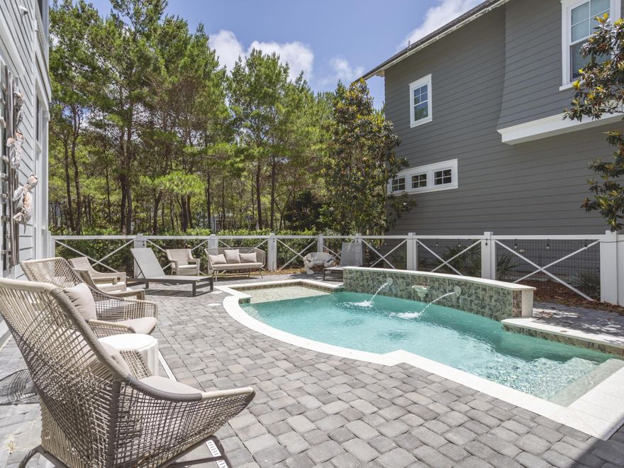 Tucked behind the hedges in WaterSound Beach, 44 Tidepool Lane sits on one of the best lots in the neighborhood--right along ''Puttering Park'' and just minutes from the sand. With a private pool, multiple porches, and four levels of updated living space, this one checks every box. The first floor features a large open living area with a tabby fireplace, exposed beams, shiplap, and whitewashed oak floors. The kitchen is fully loaded: Viking and Signature Series appliances, custom cabinetry, quartz countertops, ice maker and pot filler, everything you need to entertain or enjoy everyday life in comfort. The first-floor primary suite is quiet and private, with its own screened patio and ensuite bath.

Upstairs, you'll find a guest suite with its own morning kitchen and balcony, a large third-floor lounge, a built-in bunk room, an additional guest room with an ensuite bath and covered porch, and a second luxurious primary suite with a private covered porch overlooking the park. The fourth-floor tower offers flexible sleeping or play space, complete with twin beds.

Outside, the oversized screened porch overlooks the heated pool and swim deck, perfect for entertaining or relaxing after a day on the beach. Recent updates include a redesigned porch, repositioned windows for better views, new pool deck, fresh paint inside and out, and a custom-built bunk room.

This home delivers the best of WaterSound Beach livingand then some.

