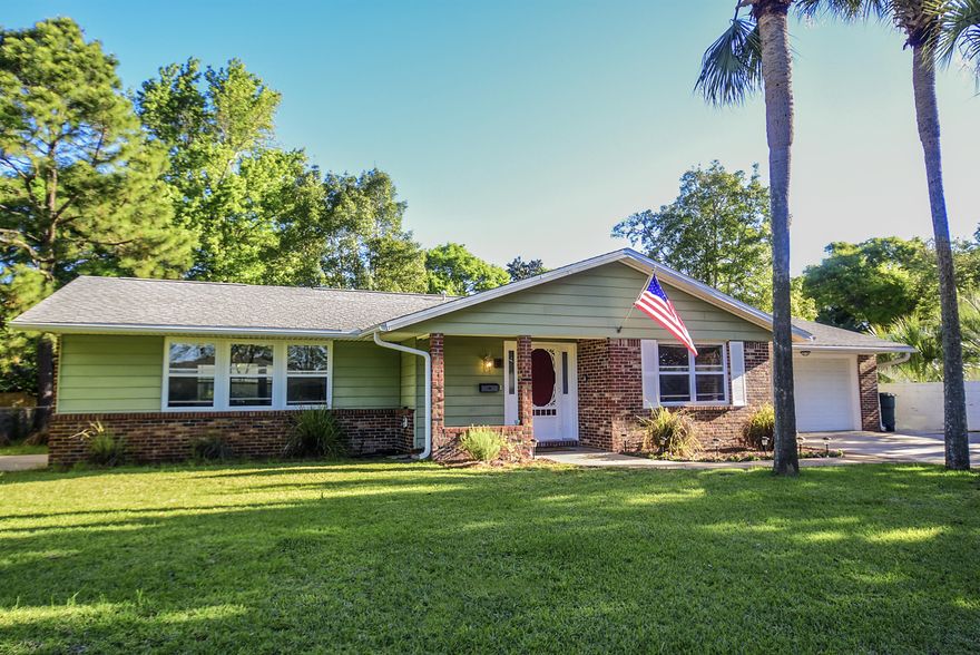 PERFECT KENWOOD HOME!!! 3 Bedroom 2 Bath with 2 Car Garage! This is a centrally located Fort Walton Beach Community with side walks & elementry school located inside of the neighborhood! So So Cute! Enjoy your Open floor plan and Bonus room as a double living room, play room or office. Brand New Laminate wood flooring, newer windows, 2005 Dimensional Shingle Roof, 2014 Whole House Copper Wiring! New Water Heater (2013), New A/C(2012). You will love this open kitchen, painted cabinets and newer appliances & tiled floor. The kitchen is open to the family area. Beautiful fenced back yard with large patio, yard building and Fruit Trees to include Tangelos, Lemon & Fig Tree!