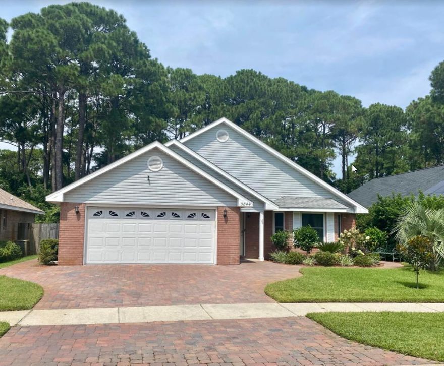 Move-in Ready in the heart of Destin!  All NEW WINDOWS and DOORS (with transferrable warranty) plus a NEW GARAGE DOOR in 2020, NEW A/C in 2021, BRICK PAVER DRIVE and WALKWAYS added in 2020. NEW ROOF in 2019, as well as a REMODELED EAT-IN KITCHEN with new kitchen cabinets, granite countertops, breakfast bar Krause sink, garbage disposal and faucet. New Vivint Security system with cameras and video doorbell conveys with the sale. The LUSH BACKYARD with fruit trees backs up to a wooded reserve. Seller has continually enhanced the landscaping including NEW SOD and NEW IRRIGATION SYSTEM in 2020 and added a planting sink in the backyard.  The NEW LARGE COVERED BACK PATIO with ceiling fan allows for backyard enjoyment even on the hottest days! A split-bedroom floor plan has a generous sized...
