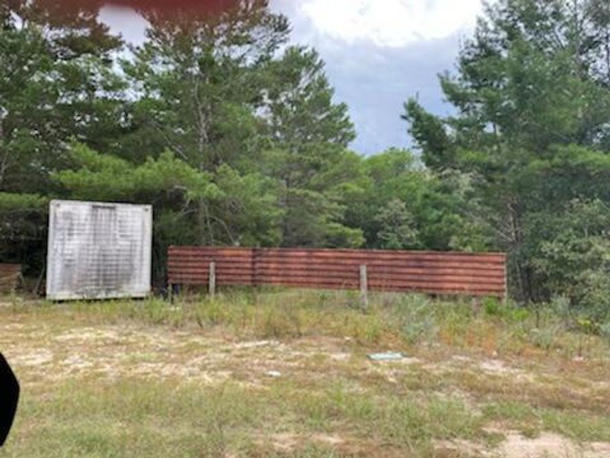 This a listing of 3 lots (approximately .24 acre each) with one septic tank and Mossyhead water tap on the property.  There is no value placed on the mobile home as it is not livable.