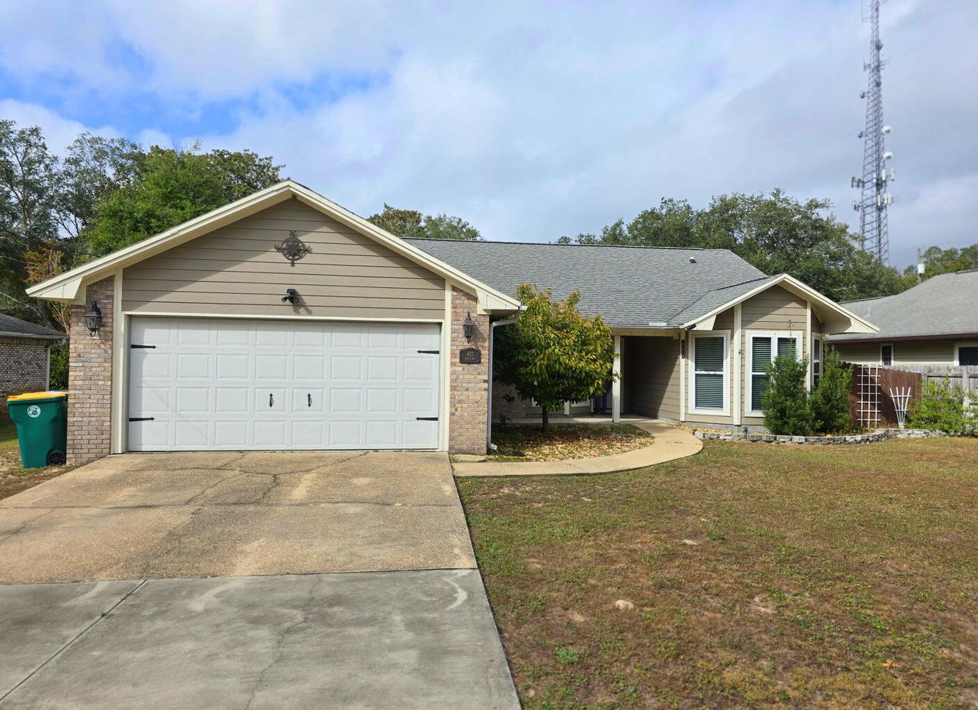 Beautiful Bluewater Bay home with 3 spacious bedrooms and 2 full baths. This is a split bedroom floor plan. The large living room features a fireplace. Kitchen has stainless steel appliances and a breakfast bar.  The sunroom is heated and cooled. Privacy fenced back yard has a firepit with seating area.Call to schedule an appointment to view. 'Also listed for sale see MLS #952193'