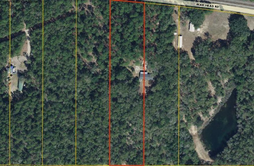 3.67 Wooded acres in Defuniak, just outside of town. This parcel stretches from Bear Head Rd to Via Internacional in the Subdivision behind it. There is potential to have access from both roads. Well and Septic needed but Natural Gas is available on this rural acreage.