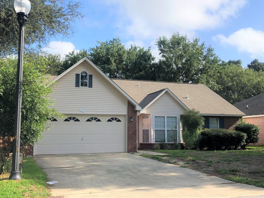 AVAILABLE JULY 10- 4 Bedroom 3 FULL Bath home in the gated community of Parkwood Estates. The primary bedroom and en suite, as well as a second bedroom and full bathroom are downstairs and an additional two generous bedrooms, loft area and a full bath upstairs. The kitchen features granite countertops, stainless steel appliances and a breakfast nook looking out over the fenced back yard. The entire living room, dining room, kitchen, hallway and breakfast nook have had stunning new wood floors put in with a 'Coastal Chic' look. There is an indoor laundry room with washer and dryer, a 2 car garage and it sits directly across from community greenspace for neighborhood use. Super close to schools, shopping and amenities. Bluewater Bay features Tennis & pickleball courts, swimming pools, golf