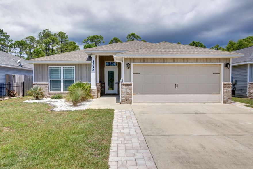 Welcome home to this beautiful and affordable perfectly located East Navarre craftsman home in the popular neighborhood of Duncan Ridge! Featuring 3 bedroom, 2 baths, and an office space in 1555sqft, this is the move in ready beauty you've been waiting for! Enjoy a neighborhood setting with a short commute to Hurlburt and conveniently located walking distance to Navarre High School as well as the YMCA, NYSA, dog parks, and sports facilities. Pull up the drive and you'll appreciate the pavers extending the driveway and you'll love the location just off the cul-de-sac on a dead end street! This fantastic split floor plan showcases two nice sized bedrooms and a shared bathroom at the front of the house, and through French doors you'll find the master bedroom on the other side. Enjoy an open