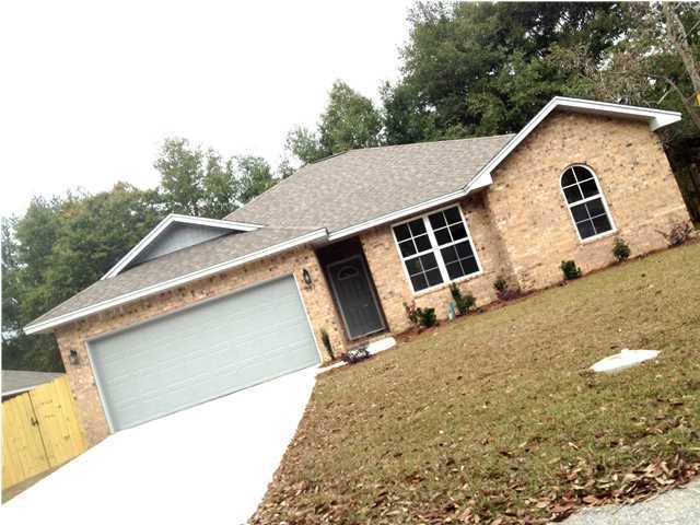 Right in the heart of Niceville, you will find this charming new home available from a builder who has built quality homes in the area for over 25 years. This open and airy floor plan contains 4 bedrooms and 2 baths. Features of this new home consist of all brick exterior, beautiful cabinets, granite countertops, Stainless under mount kitchen sink, Stainless Steel kitchen appliances, covered lanai in rear of home, tile is all wet areas, quality carpet in bedrooms,laminate wood flooring in all remaining areas, full Landscaping & irrigation System, Pull Down Attic Stairs in Garage, automatic garage door opener, marble vanities and tubs with showerheads, crown molding in main areas, 6' privacy fence, one year Home warranty is provided and Builder will pay $2,000 towards all closing