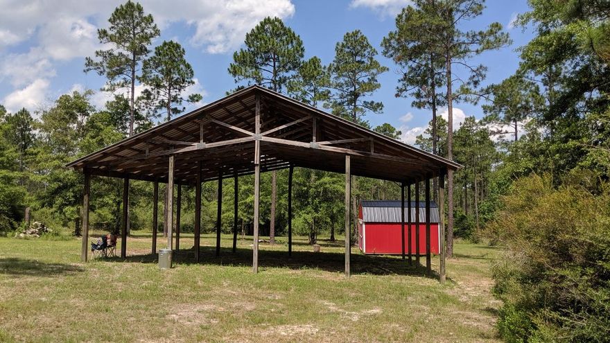 Are you looking for a perfect get-a-way or retreat to ride horses or atv's? Like to fish or hunt, then look no further. This 10.5 acre parcel has everything and ready to enjoy. The property has a 40ft x 40ft pole barn, brand new 12 x 16 shed, a deep water well, septic system, and best of all, it already has power there. Build your dream home or bring your RV and hang out! Walton Plantation is a privately held gated community for outdoor and hunting enthusiasts. Included in the 6900 original acres are 145 privately owned parcels, access to a rustic outdoor chapel, public restrooms, ponds for fishing, a community garden, atv riding trails, equestrian trails, and a hunting club for an added $250 annual fee that allows hunting on approximately 2000 acres.