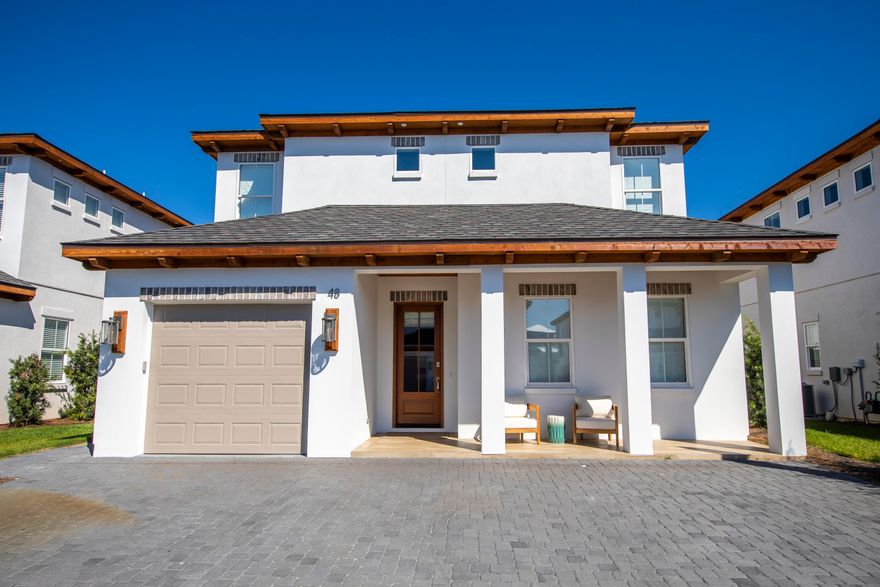 New construction, beautifully furnished and turn key 4 bed 4.5 bath home walking distance to Gulf Place. This home features a ton of upgrades-tankless water heater, stainless steel appliances throughout, shiplap walls, 2 master bedrooms, covered patio, custom built-in bunks, standing soaker tub, first and second floor living space and private pool. This home sits on a quiet, private street with a 1 car garage and 3 additional spaces in the driveway.Gulf Place features shops, restaurants, and public beach access. This home is also within a mile of the Santa Rosa Golf and Beach Club.