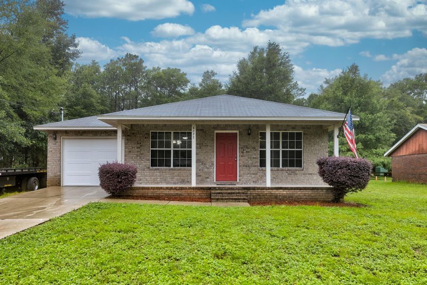 Seller will provide a brand new roof prior to closing with acceptable offer! This 3 bed, 2 bath all brick home is just outside of town and waiting for you! Sellers have installed brand new carpet throughout, tile in the wet areas, brand new back door to be installed prior to closing, and it's also been freshly painted! Schedule your showing today before it's gone!