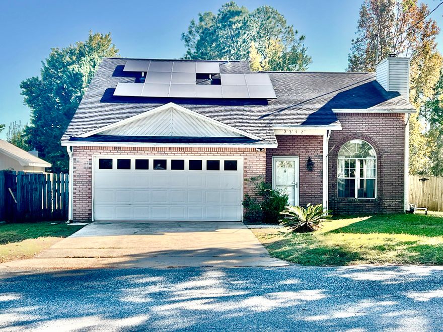 Assumable VA loan with a 2.875% rateWith a lovely lake front view from the front yard and Just minutes to Eglin AFB or Hurlburt Field, this updated Fort Walton Beach home sits in a prime location with energy efficiency features. Roof 2017, HVAC 2014, water heater 2020.Open floor plan with vaulted ceilings welcomes you upon entry. Hardwood and tile flooring throughout (stairs excluded). Fully updated kitchen with granite countertops, stainless steel appliances, and abundant cabinet space. Master suite features a walk-in closet, and a second bedroom also has a walk-in closet for ample storage.Solar panels (2022) offer significant ongoing savings on electric bills 'Approximately $120 during the summer' and enhance overall energy efficiency. Buyer must assume solar loan at closing