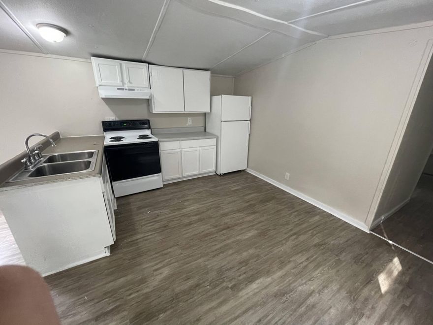 Recently remodeled 3/1.5 mobile home located in a quiet park. There are 2 regular bedrooms and a guest bath. The 3rd bedroom has a half bath. Pets allowed with deposit. Washer and dryer hookups in the unit