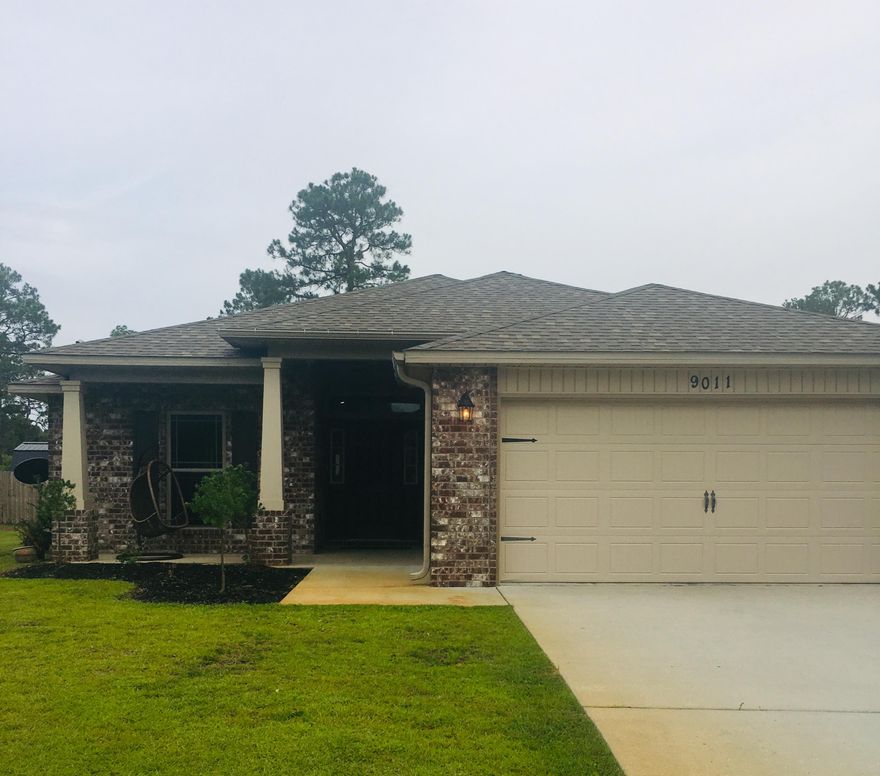 1.04 Acre! Better than new, built in 2016. Open floor plan with granite, recessed lighting, beautiful cabinets and wood look vinyl throughout except bedrooms. Lot's of upgrades! Situated in East Navarre close to Navarre beach and Hurlburt Field. No HOA. More pictures to come.