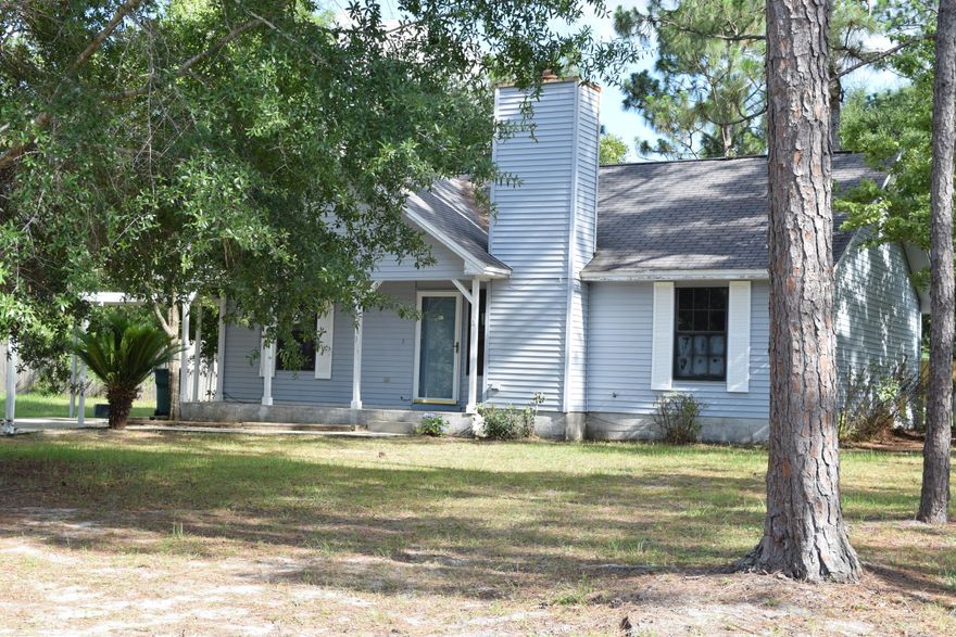 REO on a large lot, south of I-10. Fenced .36 of an acre back yard + shed on the property. Cathedral ceiling and fireplace in the Living Room. Split bedroom plan with a walk-in closet and cathedral ceiling in the Master Bedroom. Dining room accented by a tray ceiling.Conveniently located south end of town close to all shopping, military bases and schools. Buyer to verify all information they deem important.