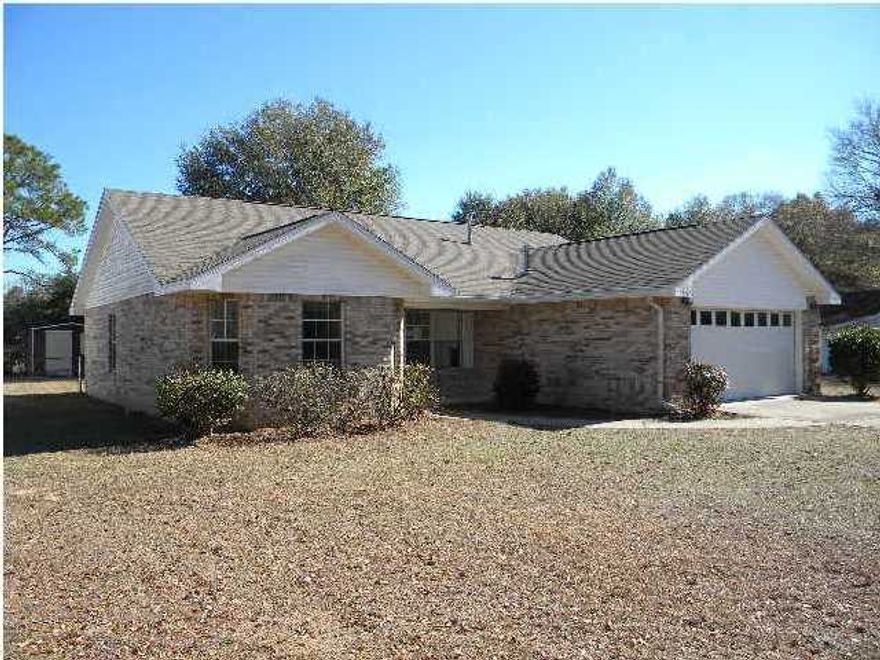 NOT A SHORT SALE!!! Freshly Painted Inside - Beautiful 3 bd + 2 ba home centrally located in Crestview. This home has solid surface counter tops in the kitchen and master bathroom & ceramic tile in the wet areas. The living room features hardwood flooring & a gas fireplace. This home also features a security system for your peace of mind. The 2 car garage has a utility sink, attic pull down stairs, shelving and peg board. The home also has a level fenced-in backyard & storage shed. Make an appointment to view this great home today!! Sold AS-IS. Buyer to verify any information deemed important.