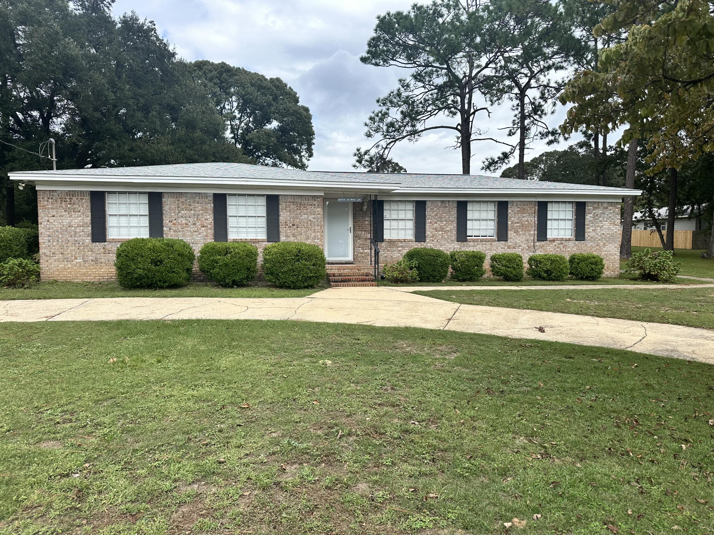 This charming Ranch-Style home is situated approximately 23 miles from Eglin Air Force Base and Ft. Walton Beach. Nestled on a generous lot, it also includes an additional parcel of land, perfect for constructing a garage, another residence or to simply enjoy as a extra space. The brick abode features three bedrooms, two bathrooms, a modernized kitchen with dining area and bar, a distinct living room, a spacious family room that houses a laundry section. The interior boast updates such as bamboo flooring and ceramic tiles. The roof was replaced in 2020 and a new air conditioning system was installed in 2022. The refrigerator, washer and dryer are included.  The home has been well maintained and is conveniently located near shopping centers, banks, restaurants, and local schools.