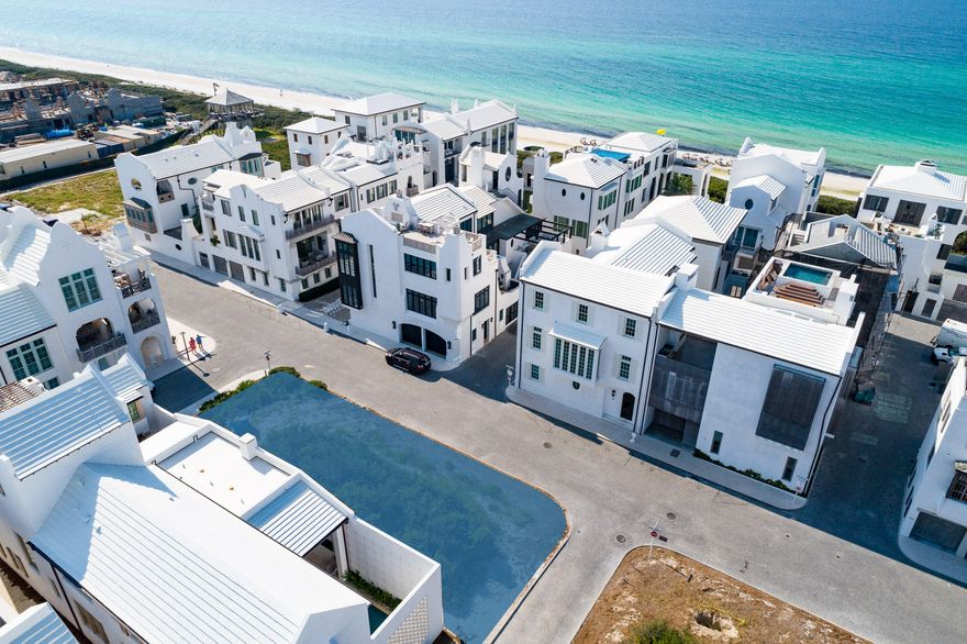Large homesite located on the South side of 30A at the corner of South Charles and Sea Garden Streets just steps to the iconic Gulf Green and beach access, and a convenient walk to the Private Owner's Beach Club scheduled to open late summer 2020. Exceptional building opportunity with two car onsite parking and two additional parking spaces in the parking court.